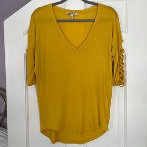 Mustard yellow/gold crisscross sleeve light sweater